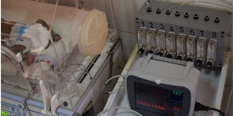 Patient monitor next to baby