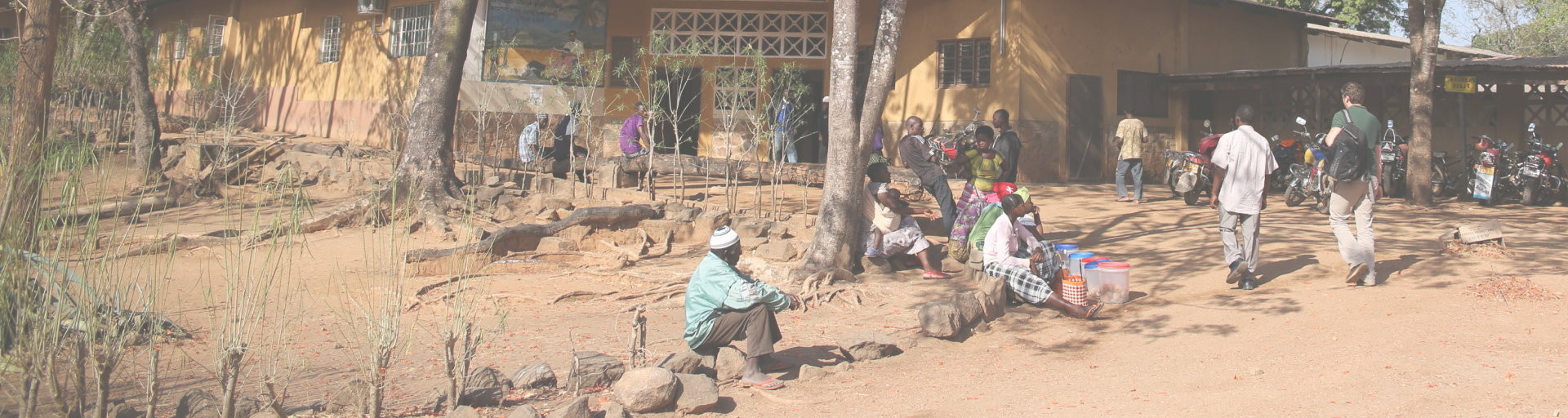 Rural scene in africa with people sat down